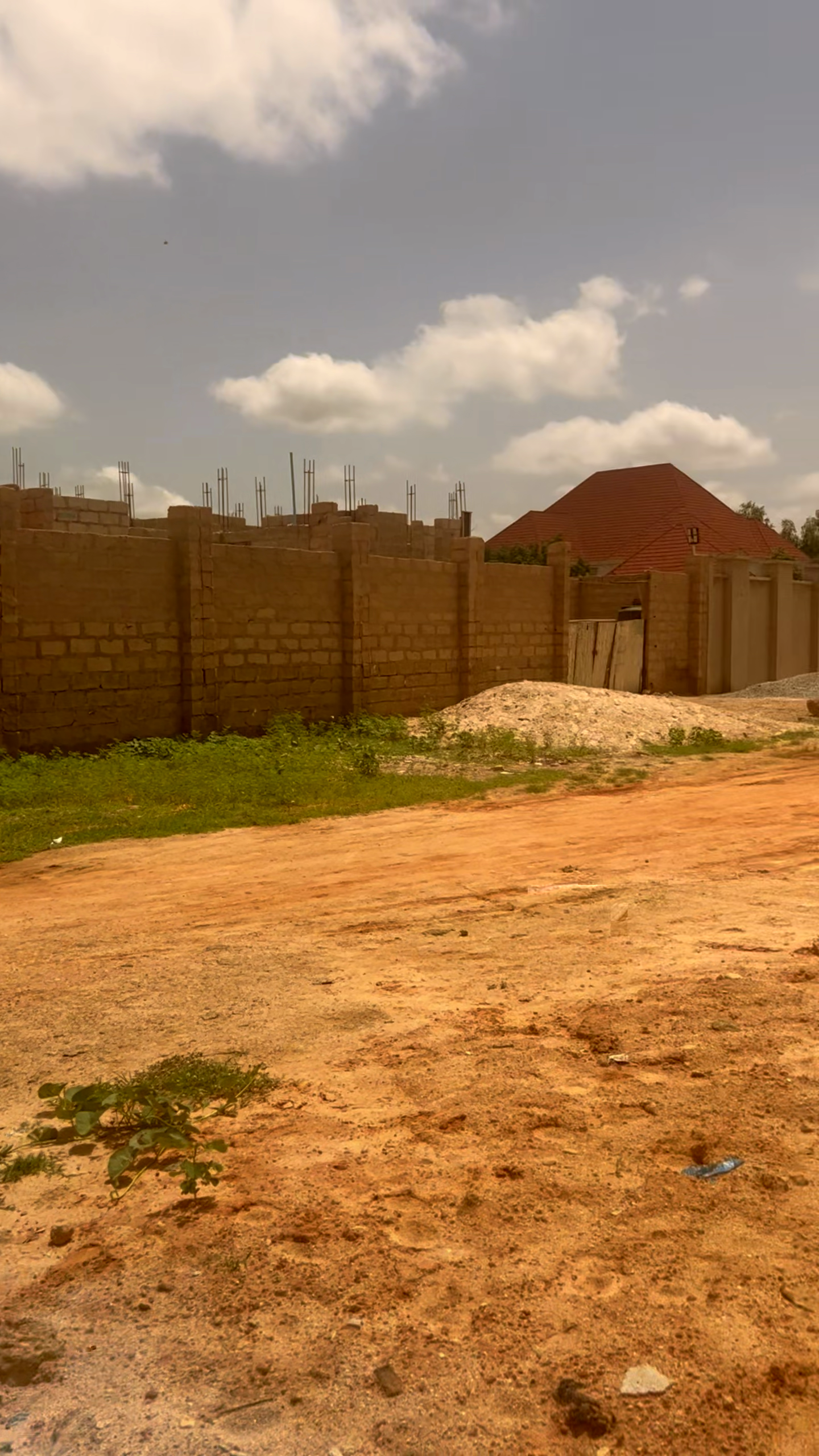 180 X 130 Plot including an uncompleted Duplex for sale in New G.R.A Modoji Katsina State going for only 185m